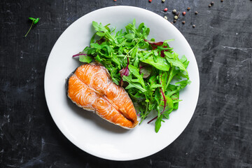 salmon and salad leaves green fish seafood snack pescetarian diet meal copy space food background rustic. top view 