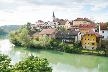 Fototapeta na wymiar Novo Mesto old town, view from the bridge over Krka river, Novo Mesto, Dolenjska region, Slovenia.