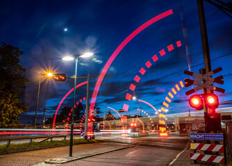 Railroad crossing at night