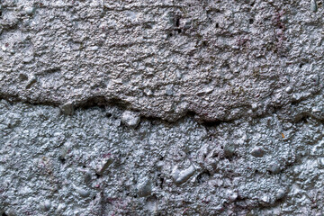 Concrete surface with a sag. Coated with silver paint. Color - Heather Hue Blue.