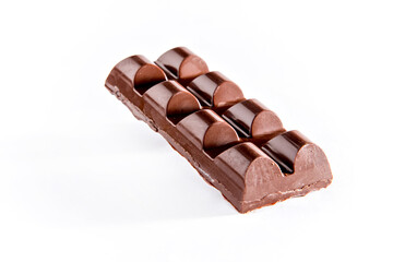 Homemade chocolate bar on white background.