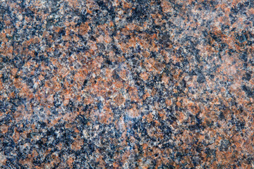 Red and blue polished granite wall background. Honed granite slab texture. Abstract stone backdrop with copy space.