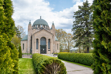The Foster Memorial, also known as Ontario's Taj Mahal, sits amongst lush green vegetation in an...