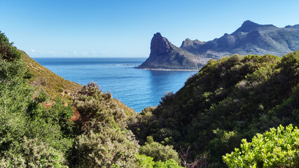 Fototapeta na wymiar The Sentinel or Hangberg is a peak marking the western end of the mouth of Hout Bay in South Africa.