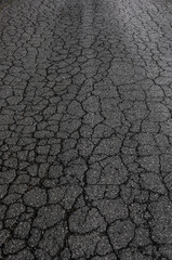 Cracks in asphalt road, Austria