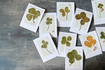 Dried Lucky Four Leaf Clover on handmade greeting cards