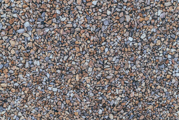 Textured sidewalk with gravel stone
