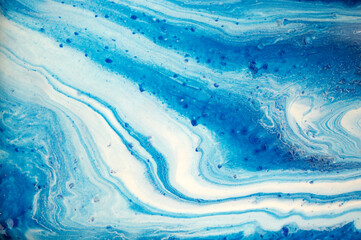 Fototapeta premium Marble blue and white abstract background. Liquid ink texture.