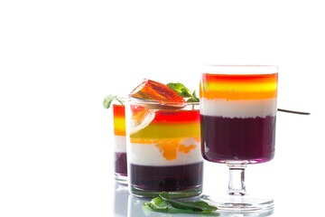 lot of colored sweet fruit jelly in a glass