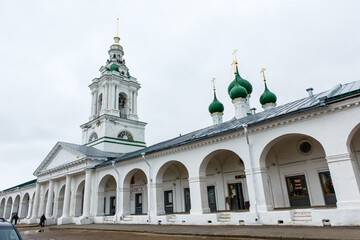 Fototapeta na wymiar Church of the Savior and Red Rows (huge trading complex) in springtime. Built in 18th century. Kostroma, Golden Ring of Russia