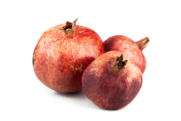 Pomegranates. Natural rural pomegranates isolated on white background. Part of set.