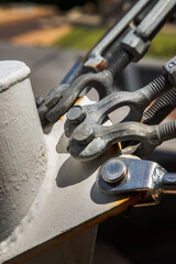 Detail of a boat turnbuckle for Wire Rope Sling. Steel turnbuckle, Fastening and Connections concept, Selective focus.