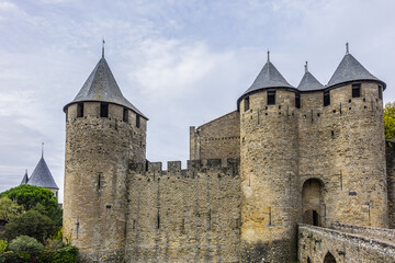 Entrance to Chateau Comtal in the walled and turreted fortress of Carcassonne La Cite. Carcassonne, Languedoc, region of Occitanie, France.