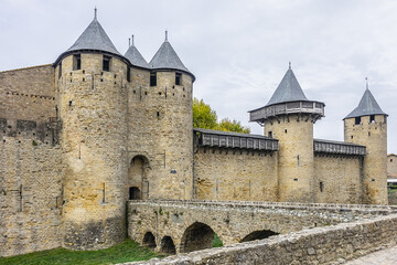 Entrance to Chateau Comtal in the walled and turreted fortress of Carcassonne La Cite. Carcassonne, Languedoc, region of Occitanie, France.