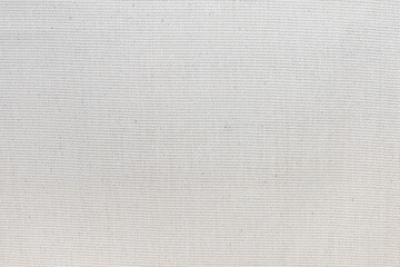exture of natural cotton fabric of ivory color close-up. fabric for eco bags. background for your mockup