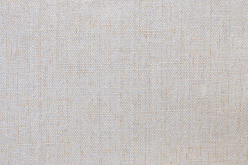 texture of natural fabric ivory color close-up. background for your mockup