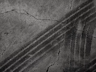 Fotobehang Close up black tire marks on cement floor © Nattawut