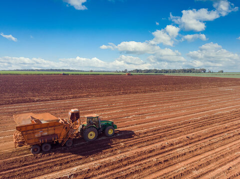 Automated tractor planting sugar cane in Brazil.- Pederneiras-Sao Paulo-Brasil - 03-20-2021