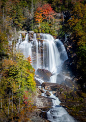 Fototapeta na wymiar Fall colors surround Whitewater falls in NC