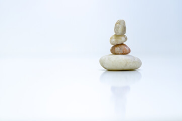 zen stones on white background