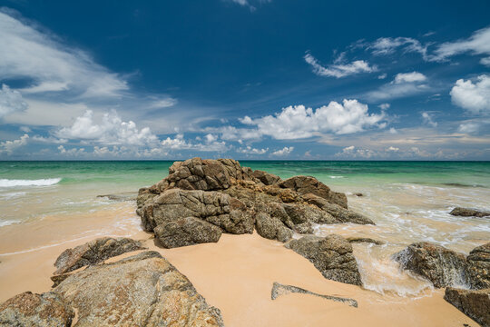 Idyllic tropical beach scenery, Big corall rock and turqoise clear sea water. beautiful nature of Phuket island