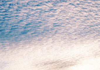 Sunset sky background. Picturesque colorful pink clouds in the sky. Blue sky background. sky landscape, sunset sky view