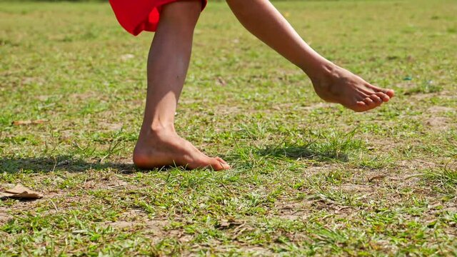 Foot Of Rural Boy Kick A Soccer Ball, Slow Motion
