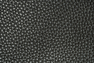  Black artificial leather surface close-up