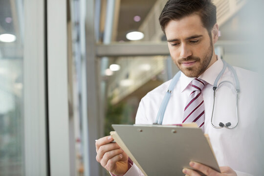 Doctor Reviewing Patient Information