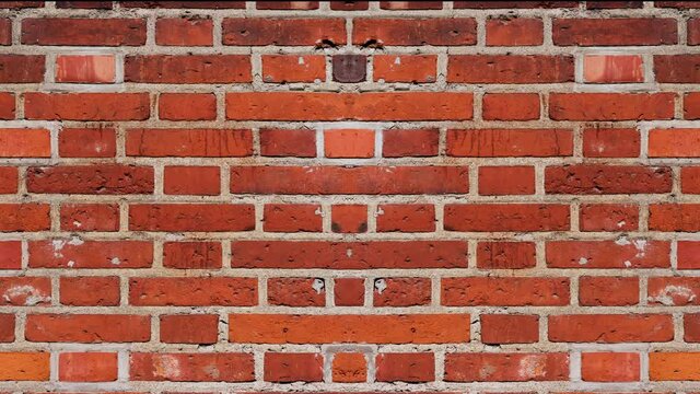 red brick wall background. 4k resolution video.
