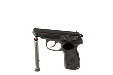 an old Soviet pistol and its clip