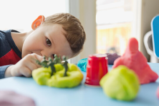 Boy Playing With Play Dough