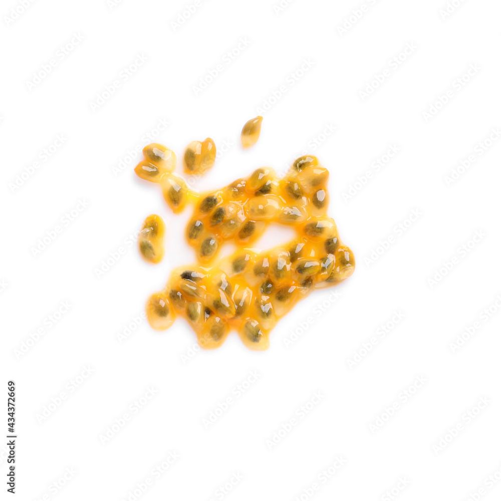 Wall mural passion fruit seeds on white background, top view