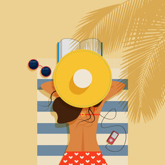 Beautiful girl lies on the beach. A girl in a red swimsuit and a yellow hat is reading a book. Tropical trees. Glasses, a pink player, a book on a blue-striped towel