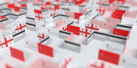 Flag of Georgia on the mockup credit card maze. Financial difficulties related 3D rendering