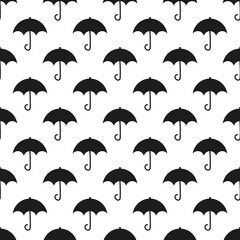 Black umbrella icons, silhouettes, signs vector seamless pattern background.
