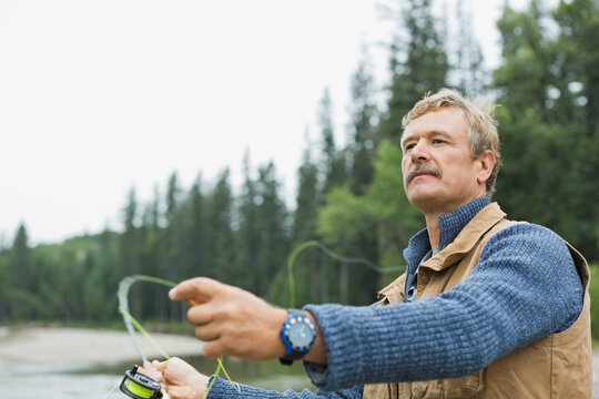 Mature Man Fly Fishing