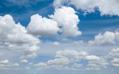 White, Fluffy Clouds In Blue Sky. Background From Clouds