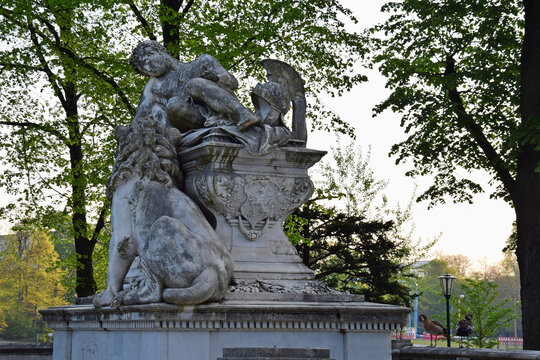 Sculpture of a warrior with a lion in the city Park