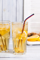 Homemade fermented kombucha tea drink with lemon and ginger