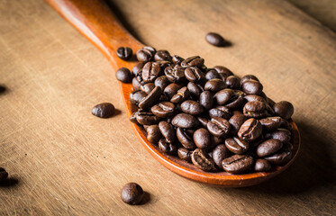 coffee beans on wooden background