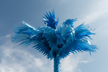 Blue palm tree against the sky. Summer scenery for the beach. Summer concept