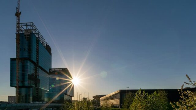 Katowice. Poland 13 May 2021. Timelapse views of Spodek, modern business city centre in sunset.