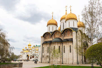 CLose up image of catherdrals with golden domes on Sobornaya square in Kremlin Moscow.  Magnificient ancient architecture of historical churches, famous touristic places in Moscow.