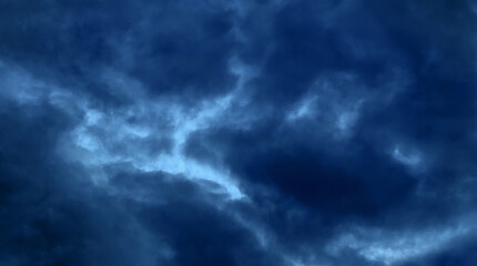 Naklejka na ściany i meble Thunderclouds dramatic. Storm dark clouds.