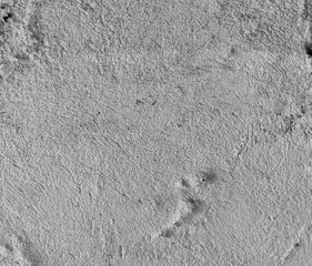 Rough black and white wall texture with strength and high contrast, ideal for creating photographic patterns and original environments.