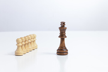 Planning strategy with chess figures on white table copy space for text