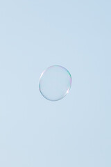 Soap Bubbles Floating On Blue Sky