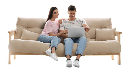 Fototapeta na wymiar Happy couple with laptop on comfortable sofa against white background