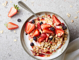 healthy breakfast yoghurt granola strawberry bowl - Powered by Adobe